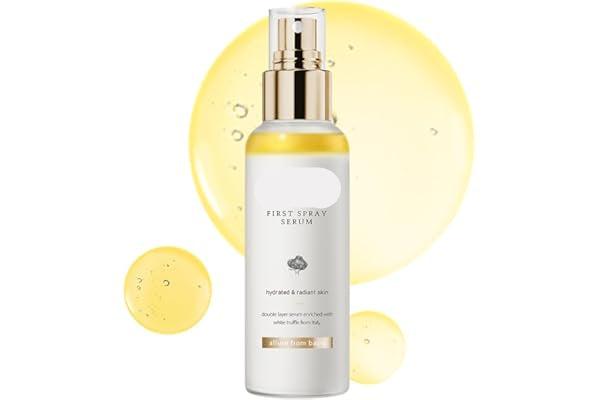 d'Alba First Spray Serum bottle with yellow droplets on a white background