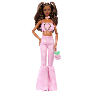 Barbie Deluxe Style Doll #12 in Pink Denim Crop Top with Matching Rose Print Flare Jeans, Wavy Brown Hair, Accessories Like Rose Handbag and Jewelry