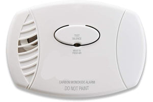 White carbon monoxide alarm with 'First Alert' branding on a white background