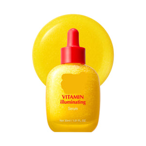 Yellow serum bottle with red dropper and yellow sponge on a white background