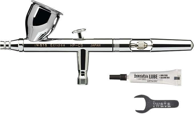 Airbrush set with 'iwata' branding on a white background