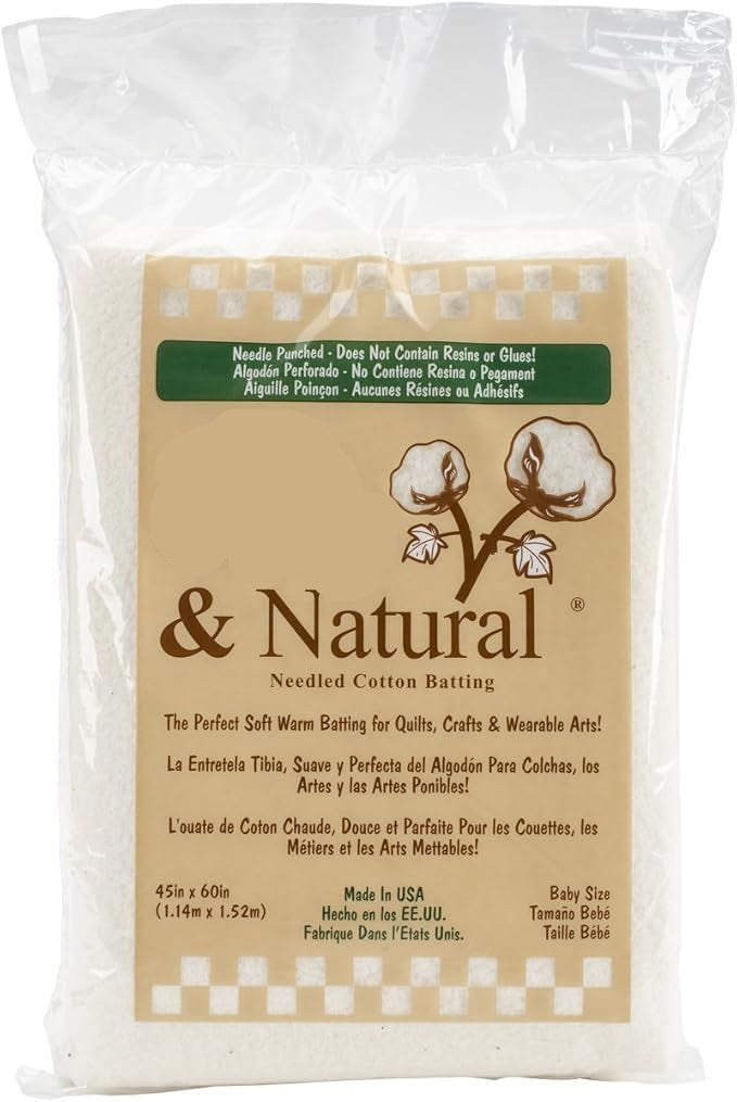 Package of Warm & Natural needle-punched cotton batting with a checkered pattern on the label.