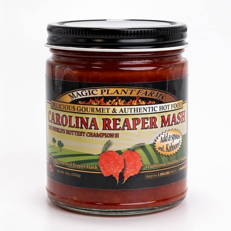Jar of Carolina Reaper Mase with a black lid on a white background