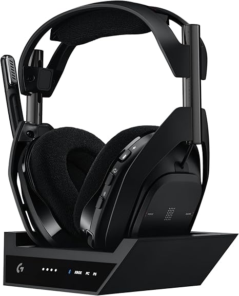 Black gaming headset with a charging stand on a white background