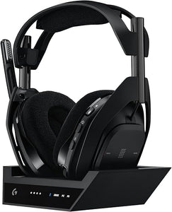 Black gaming headset with a charging stand on a white background