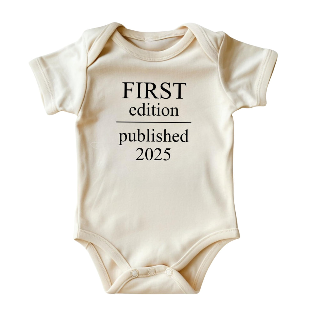 First Edition Published 2025 Onesie® • Unique Baby Bodysuit • Natural Color Clothing with Black Print • Newborn Baby Clothes