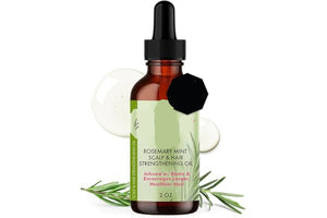 Mielle Rosemary Mint Scalp and Hair Strengthening Oil bottle with dropper on a white background