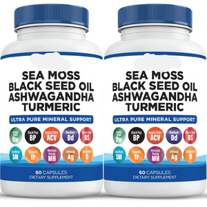 Two bottles of Liberty Essentials Sea Moss Black Seed Oil Ashwagandha Turmeric dietary supplements on a white background.