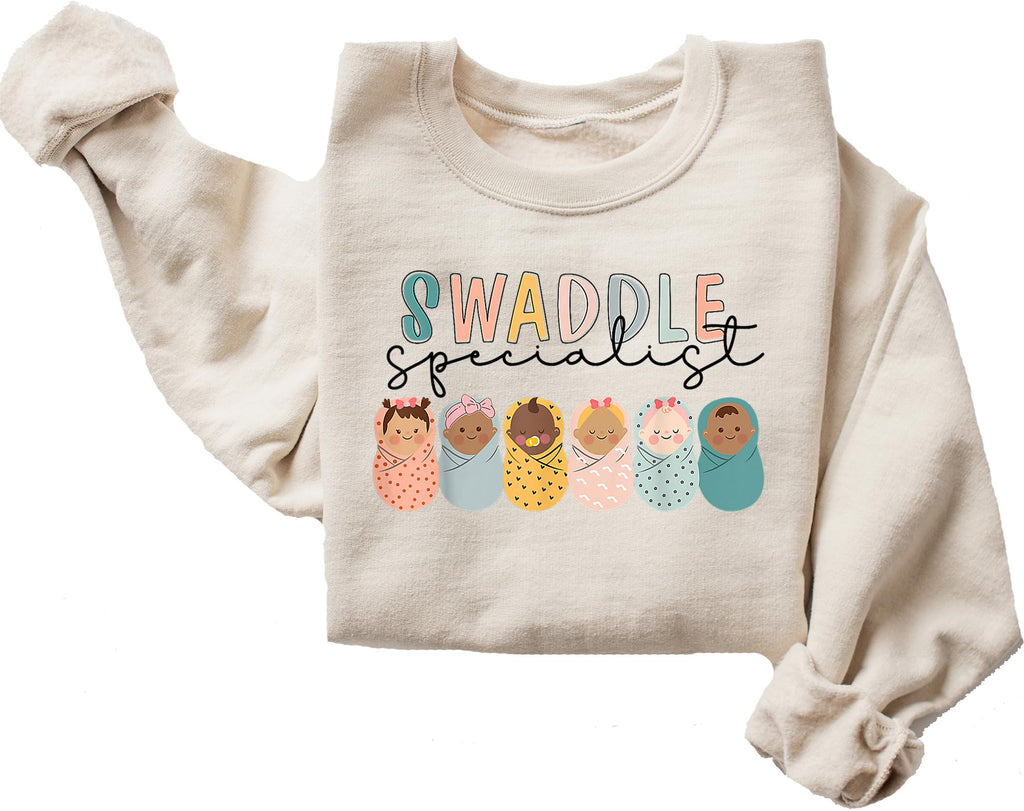 ElixirStreet Swaddle Specialist Crewneck, Labor and Delivery Sweatshirt, NICU Nurse Sweatshirt, Mother Baby Unit Crewneck, Nursery Hoodies, NICU Nurse Multi Color