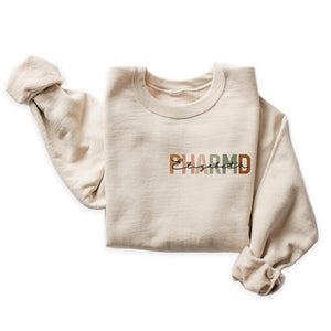 Personalized PharmD Sweatshirt, Custom Left Chest Name Pharmacist Gift, Pharmacology School Graduation, Pharmacy Appreciation Week Shirt, Pharmacist Life Unisex Crewneck Sweatshirt Sand
