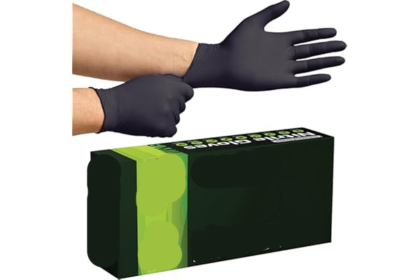 Black nitrile gloves being worn with a box of Inspire Nitrile Gloves in the background.