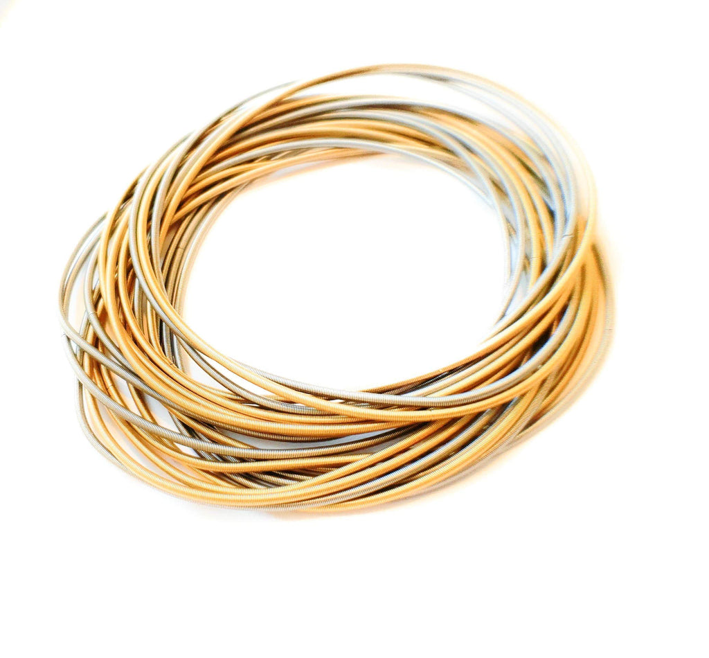 moonlidesigns Stainless Steel Coil Bracelets Set of 20 Guitar Strings 10 Gold 10 Silver Stack Layered Flexible