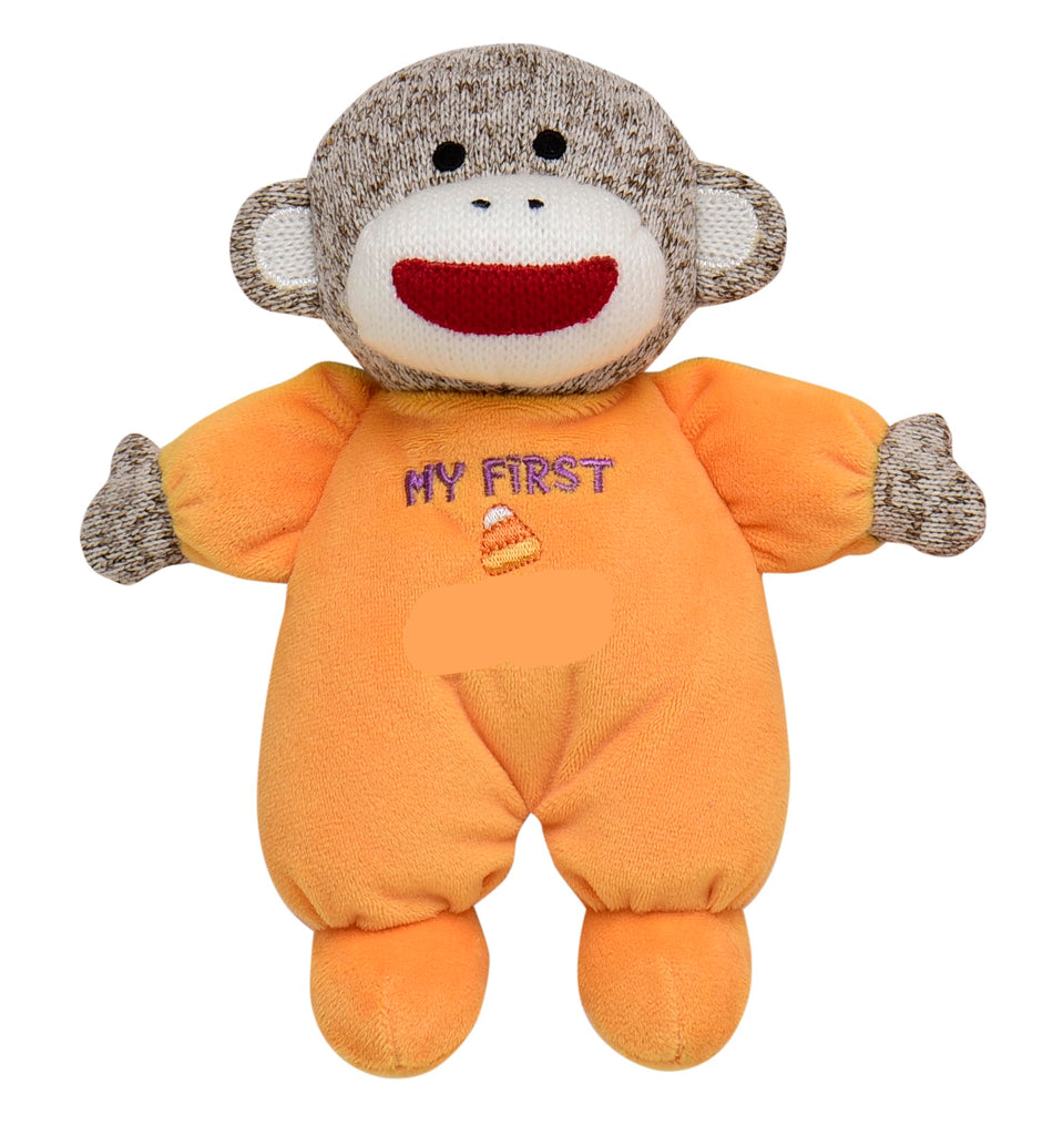 Stuffed monkey toy with 'My First Boo' on an orange outfit against a white background