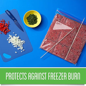 Packaged ground meat with Ziploc bag on a blue background, surrounded by chopped vegetables and a knife.