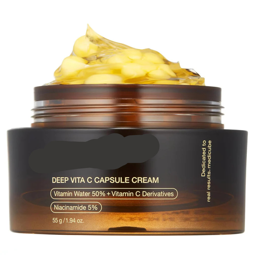 Medicube Deep Vita C Capsule Cream jar with cream on top on a white background