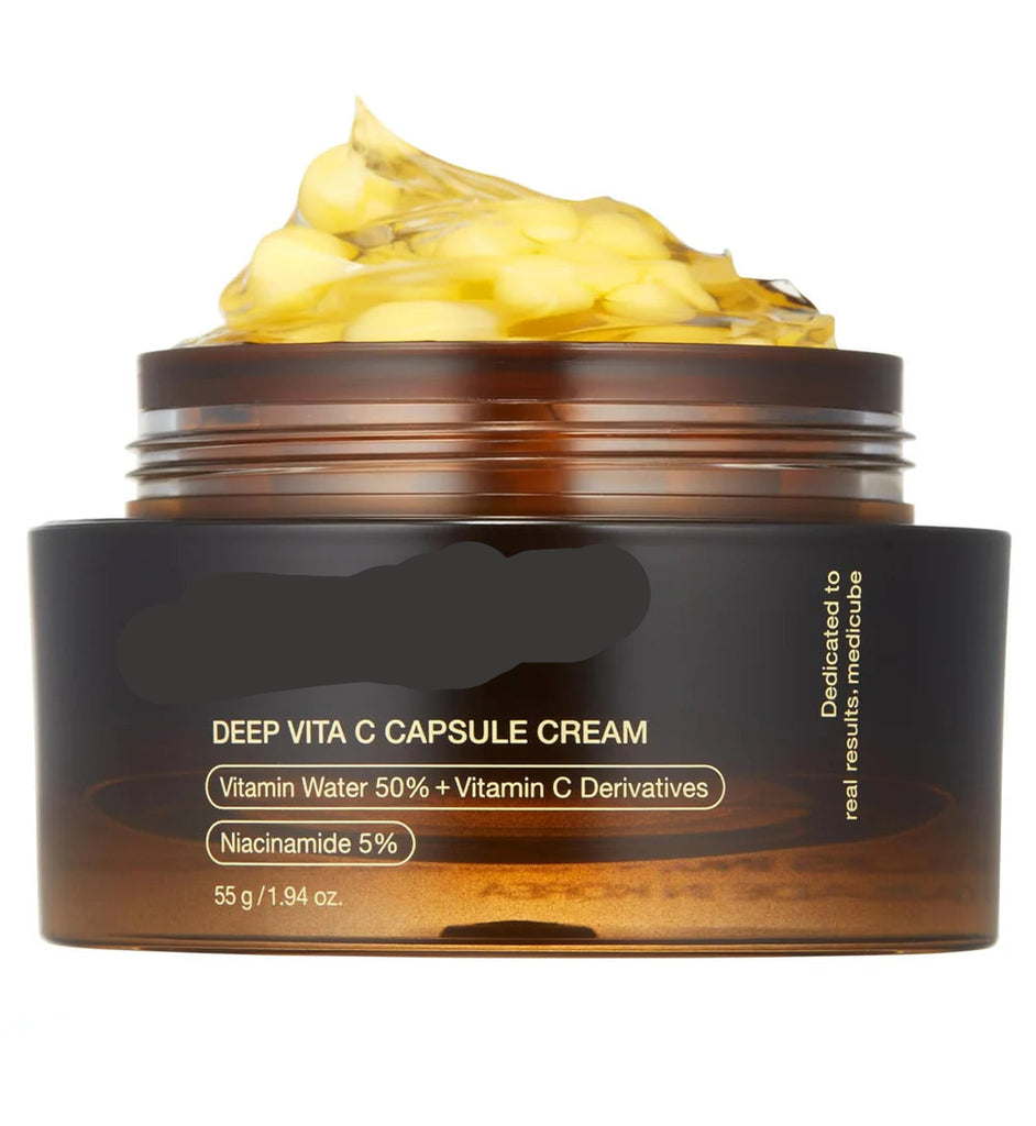 Medicube Deep Vita C Capsule Cream jar with cream on top on a white background