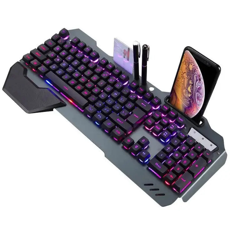 Gaming keyboard with RGB lighting, phone stand, and pen holder on a white background