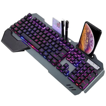 Gaming keyboard with RGB lighting, phone stand, and pen holder on a white background