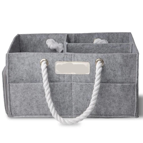 Gray baby organizer with white handles and 'Baby Things' label on a white background