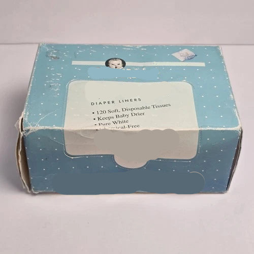 Box of Gerber EZ-liner diaper liners on a light gray background